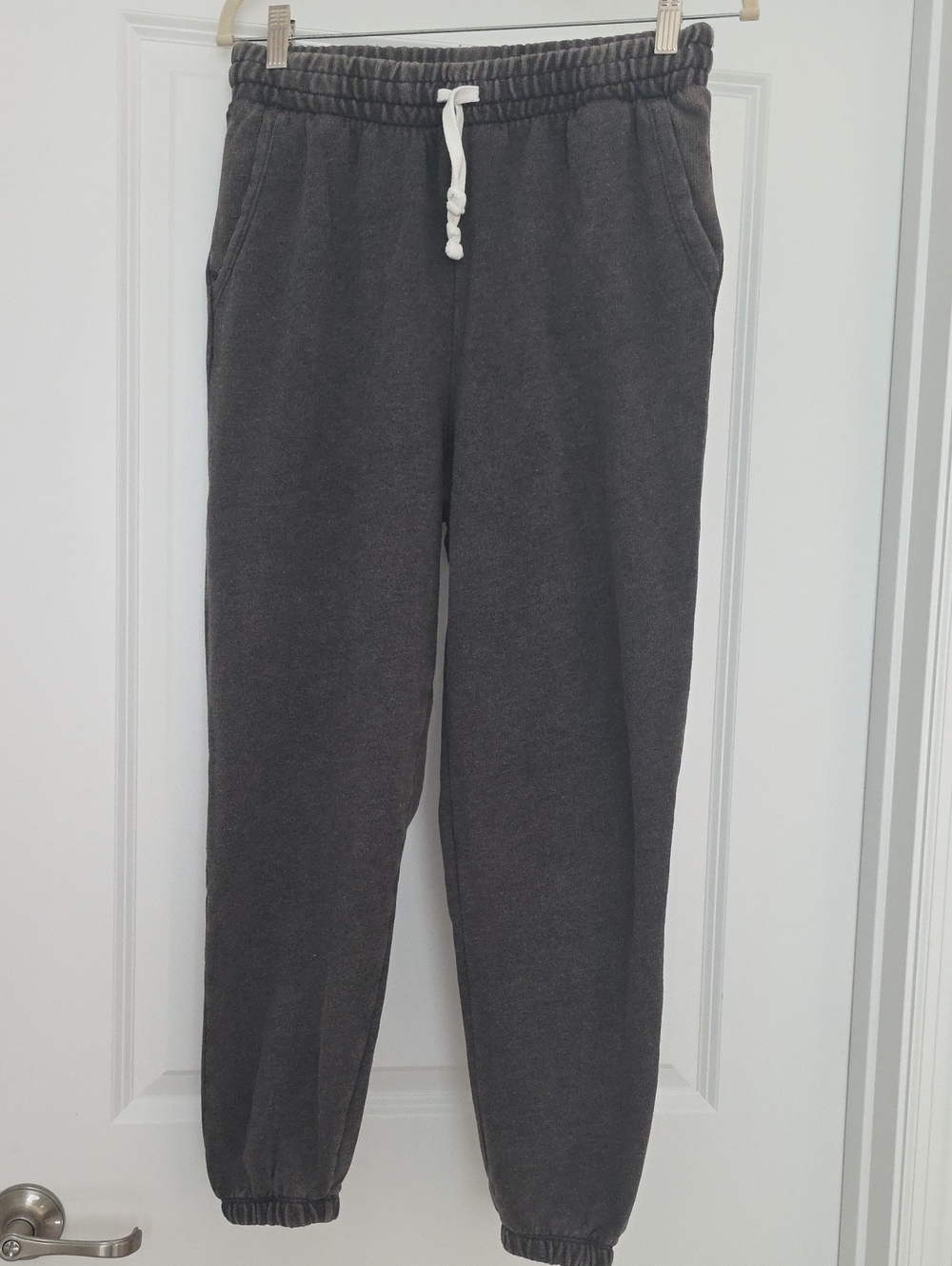 SO Women's Dark Gray Distressed Drawstring Joggers with White Cord.